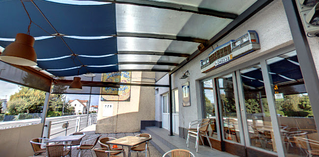 Opinii despre Okrepčevalnica Pizzeria Garaža în Ljubljana - Gastronomija in gostinstvo